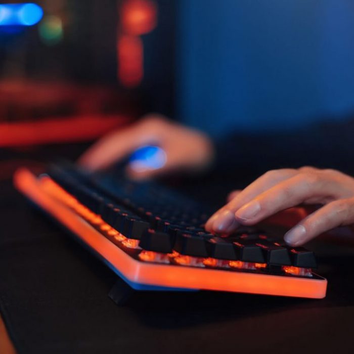 close-up-gamer-s-hands-keyboard-pushing-buttons-playing-video-games-online (1)